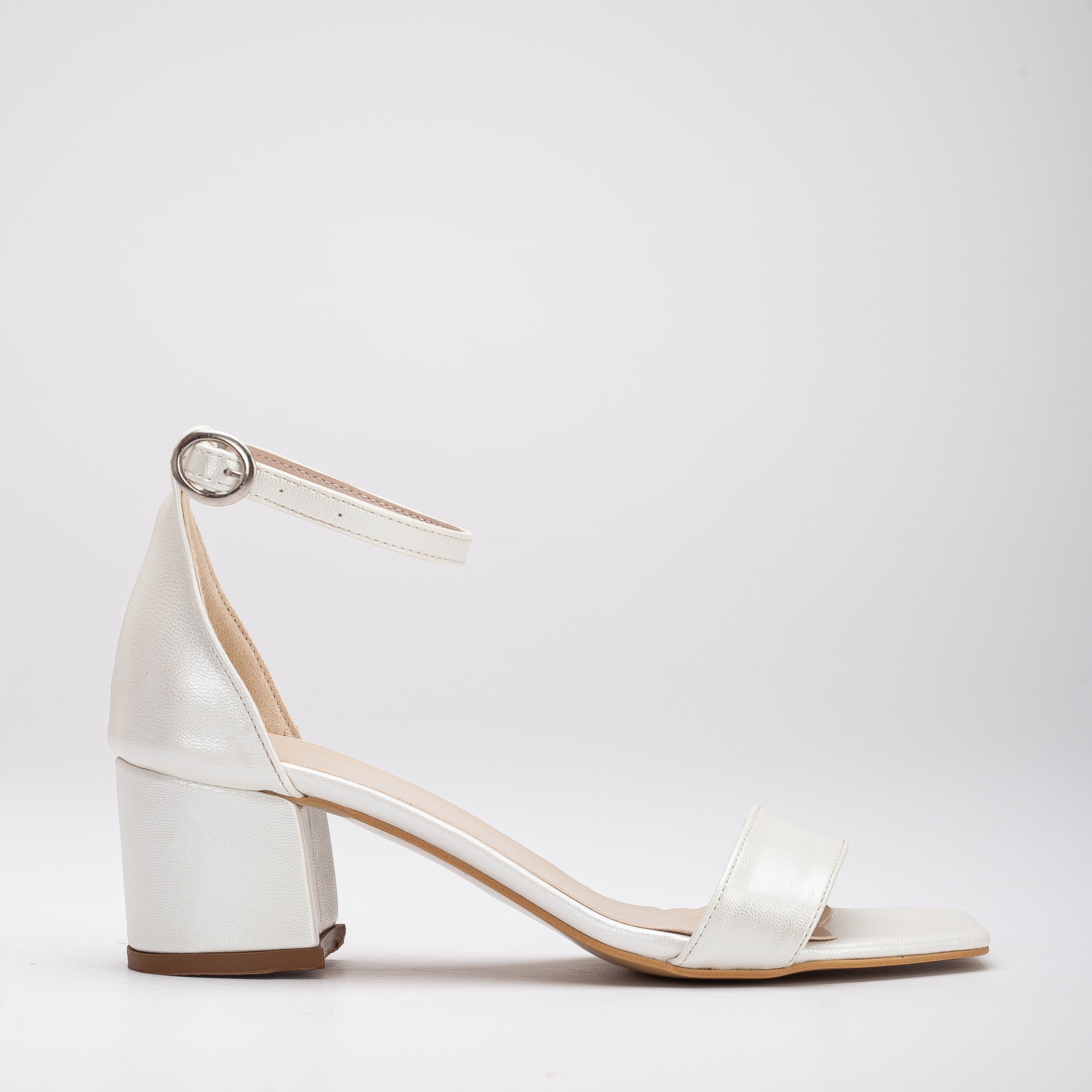 White ivory sandals, Ivory white sandals, Stylish white ivory shoes, Chic white sandals in ivory, Trendy white ivory footwear, Fashionable ivory white sandals, Elegant white ivory heels, Classic ivory white sandals, Comfortable white ivory shoes, White ivory sandals for women.