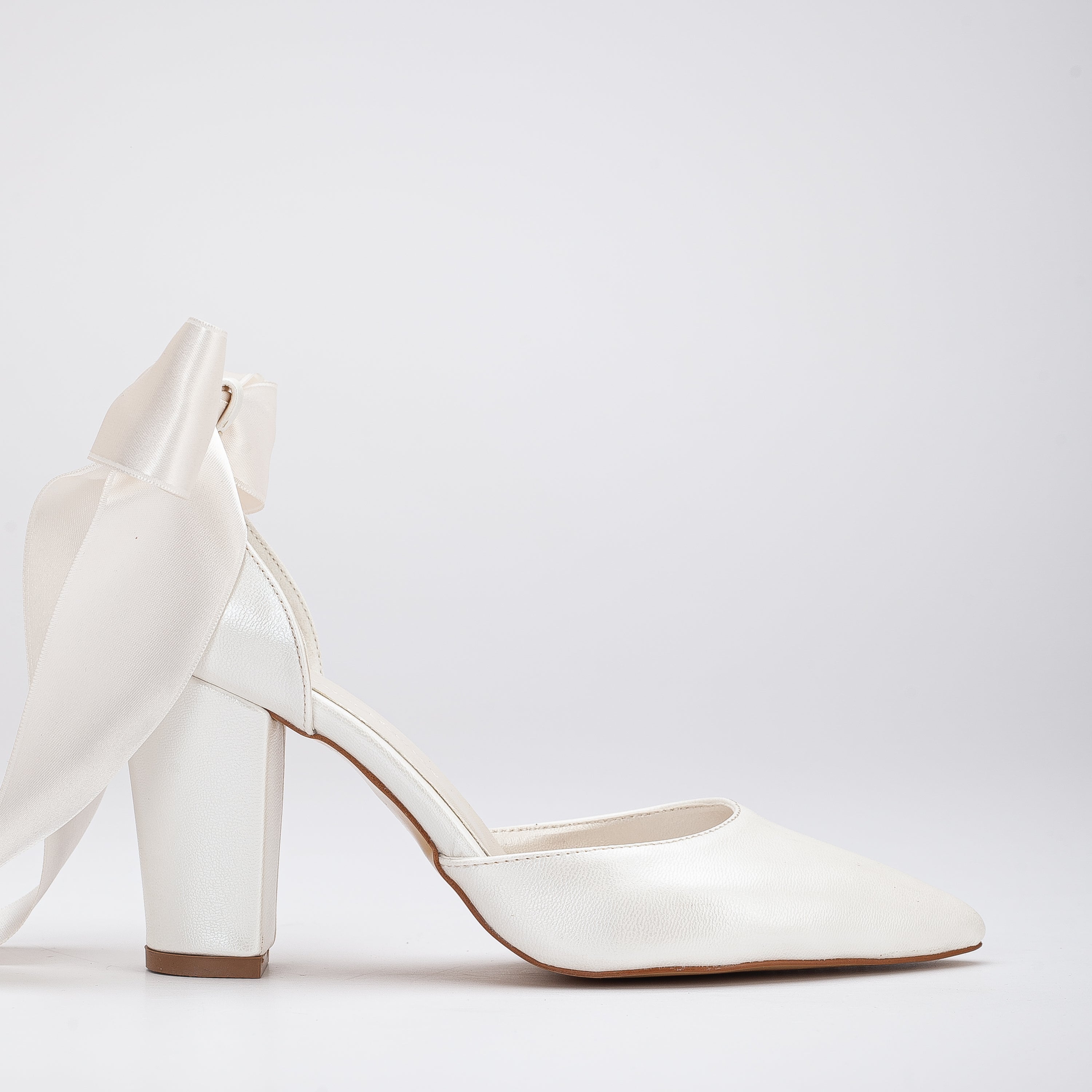 White ivory heels, Ivory bridal heels, White wedding heels, Ivory dress heels, White bridal pumps, Ivory evening heels, White formal heels, Ivory special occasion heels, White ivory high heels, Ivory heel shoes.