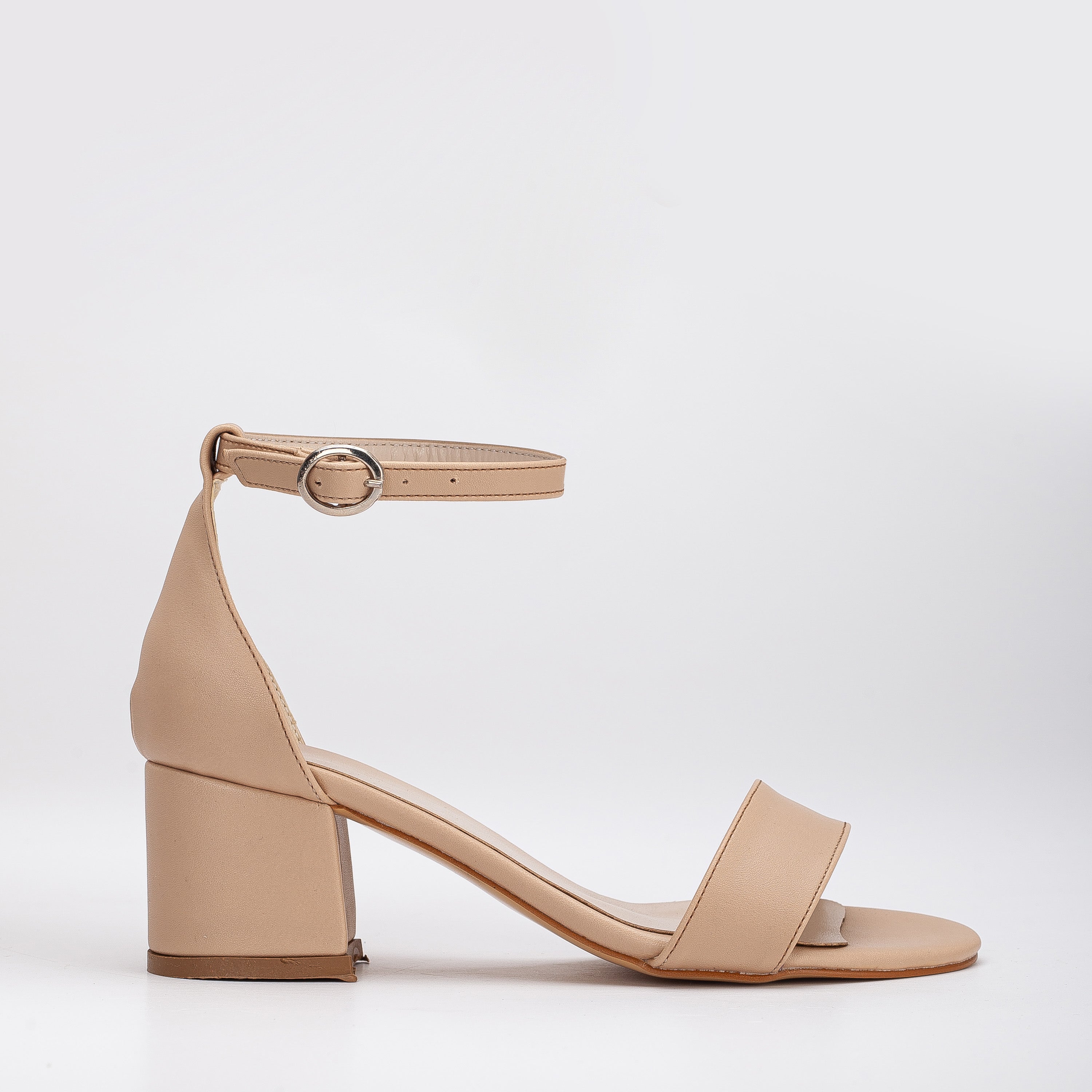 Beige low heel sandals, Low heel sandals in beige, Stylish beige low heel shoes, Chic low heel sandals, Trendy beige low heel footwear, Fashionable low heel sandals, Elegant beige low heel shoes, Classic low heel sandals, Comfortable beige low heel footwear, Beige low heel sandals for women.