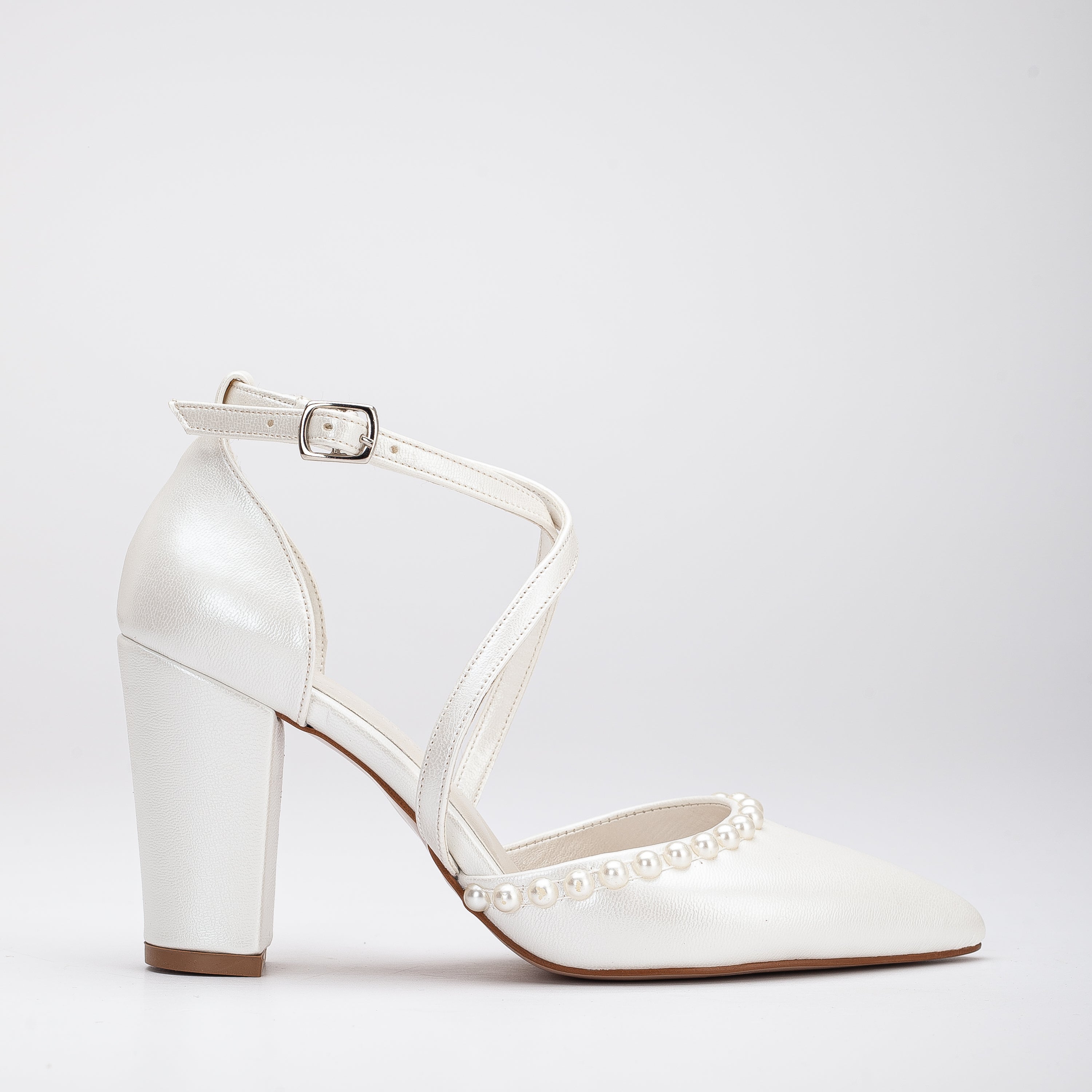 Ivory high heels, High heeled ivory shoes, Ivory stilettos, High heeled pumps in ivory, Ivory platform heels, Ivory high heel sandals, Ivory dress heels, Ivory evening heels, High heeled ivory footwear, Ivory formal heels.