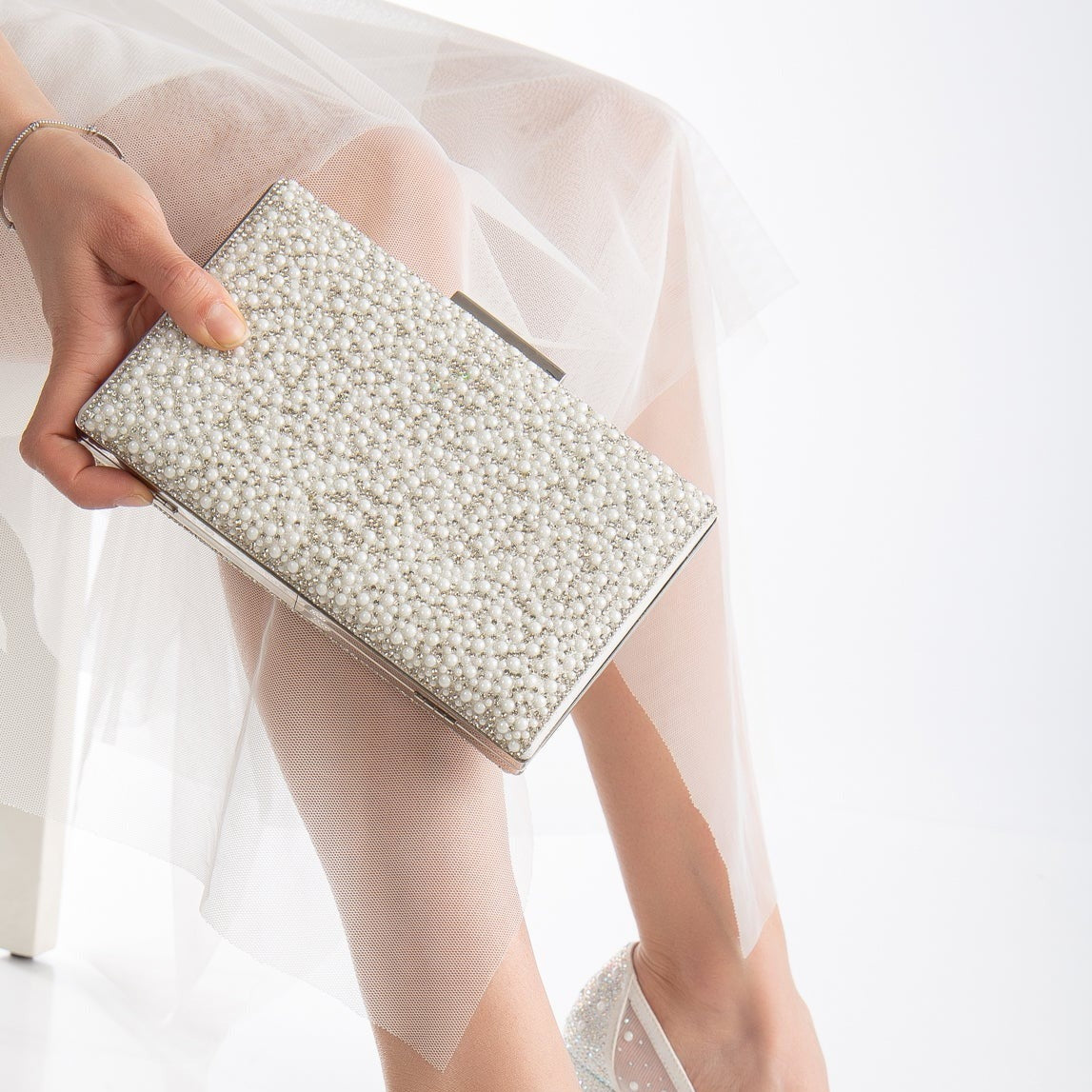 White clutches, Ivory handbags, White evening clutches, Ivory bridal purses, White wedding clutches, Ivory clutch bags, White formal purses, Ivory evening bags, White bridal clutches, Ivory special occasion handbags.