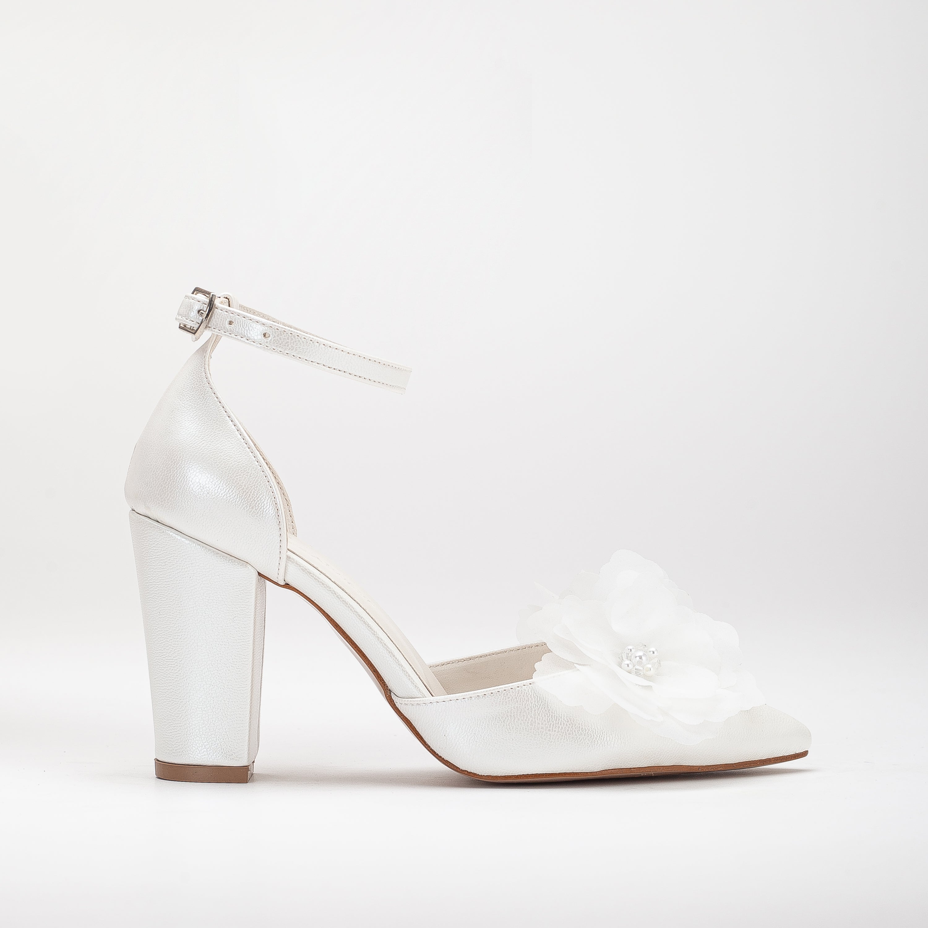 White wedding platform heels, High platform bridal shoes, White platform wedding pumps, Chunky white wedding heels, Tall platform bridal footwear, Ivory platform wedding shoes, White platform wedding sandals, White platform stiletto heels, Platform bridal shoes, White platform wedge wedding shoes, Tall white wedding pumps, Platform bridal footwear, White high platform shoes for brides, White platform wedding heels, White platform wedding sandals