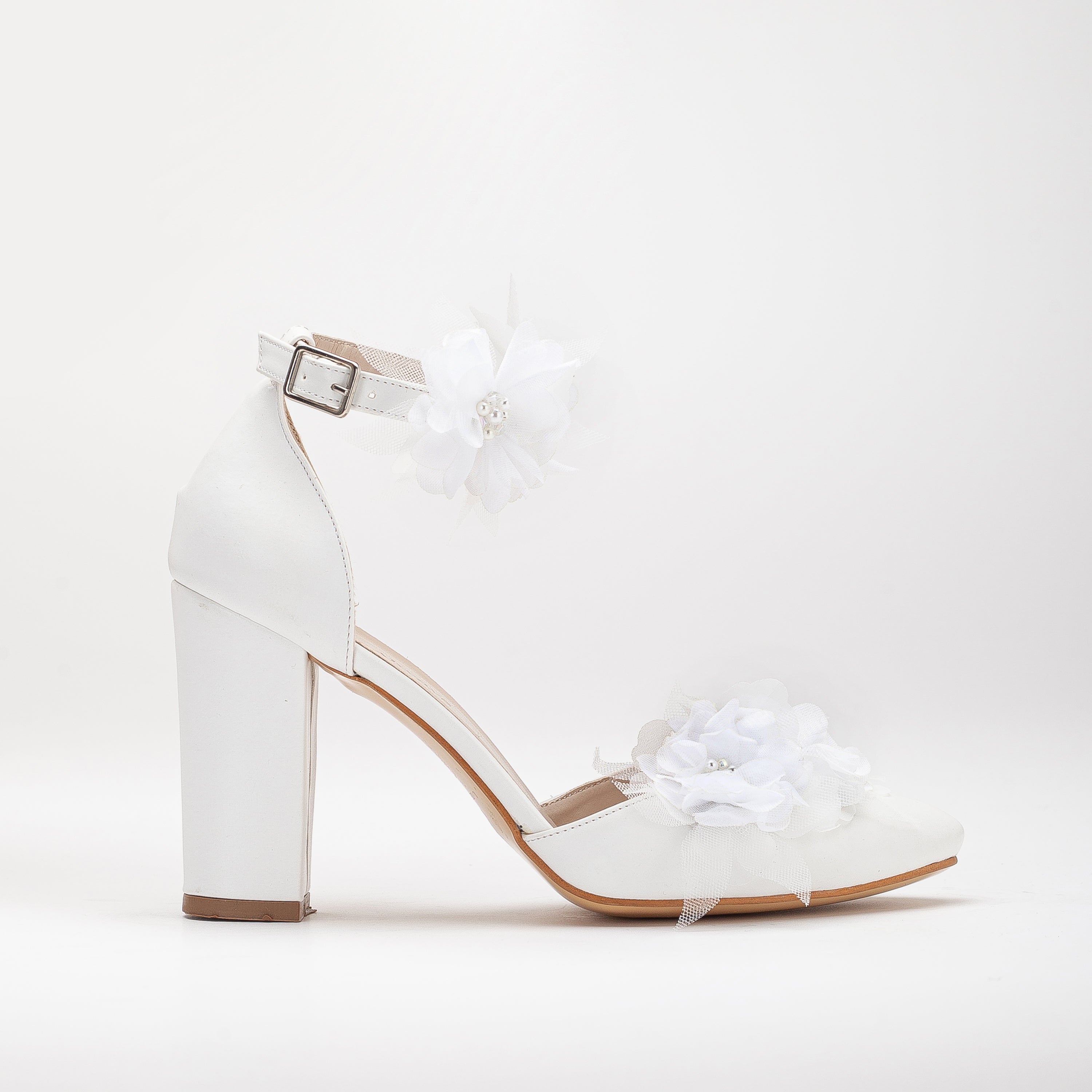 White wedding platform heels, High platform bridal shoes, White platform wedding pumps, Chunky white wedding heels, Tall platform bridal footwear, Ivory platform wedding shoes, White platform wedding sandals, White platform stiletto heels, Platform bridal shoes, White platform wedge wedding shoes, Tall white wedding pumps, Platform bridal footwear, White high platform shoes for brides, White platform wedding heels, White platform wedding sandals