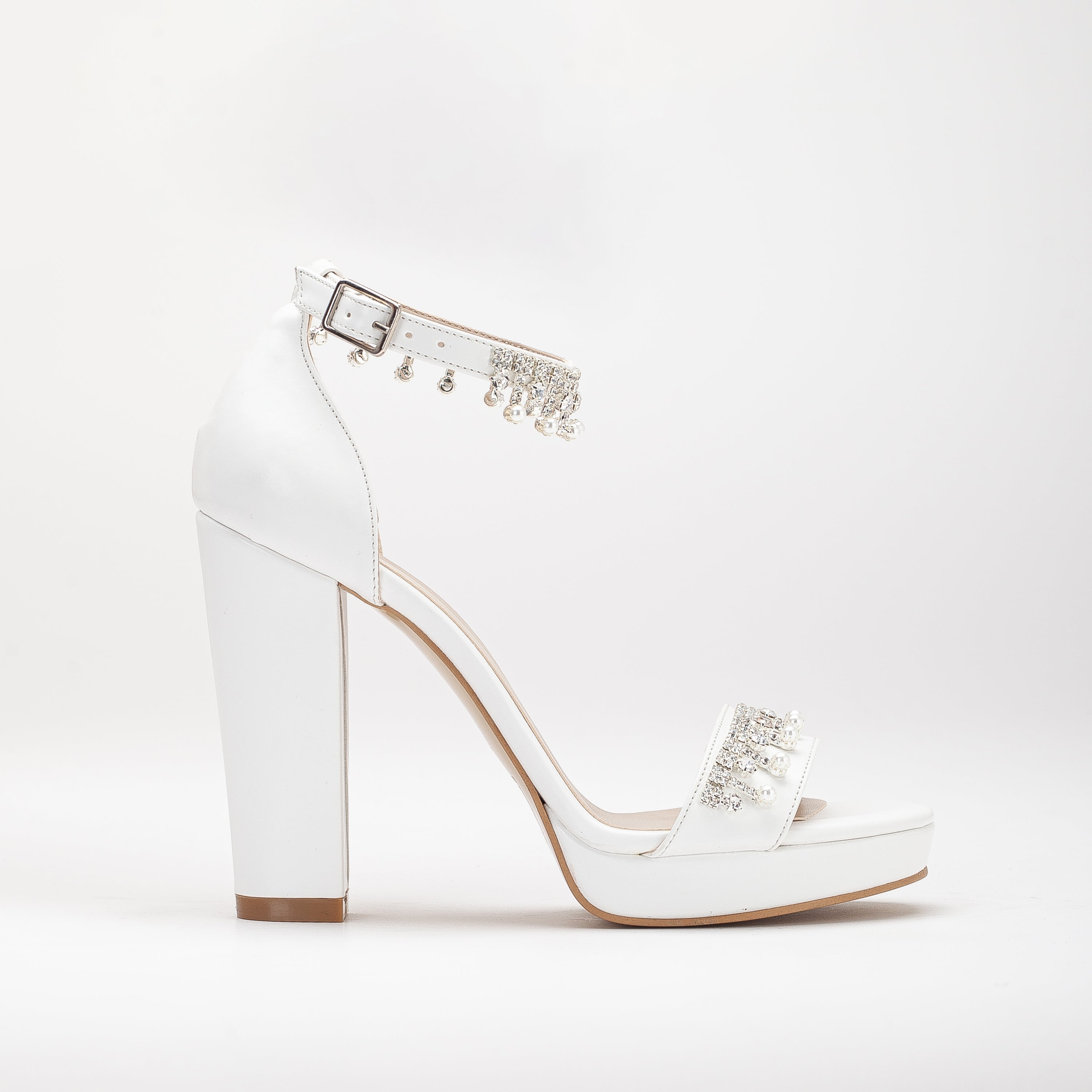 White platform bridal heels, high platform wedding shoes, elegant white bridal heels, tall platform bridal sandals, ivory platform wedding pumps, lace-up platform bridal heels, sparkling white platform shoes, peep-toe platform wedding heels, strappy platform bridal sandals, embellished platform bridal pumps.