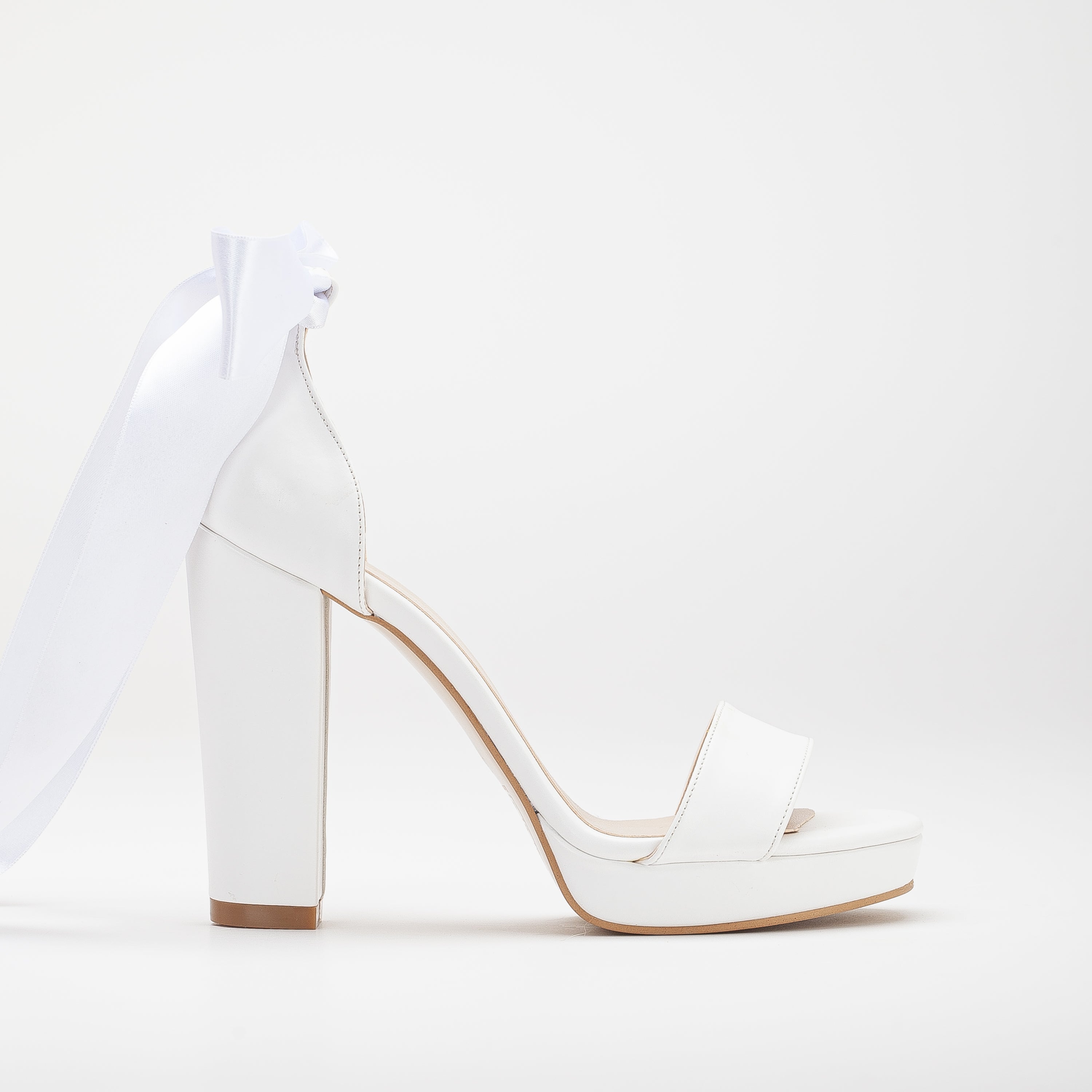 High platform white wedding shoes, Bridal platform heels, White wedding pumps, Elegant bridal footwear, Ivory platform wedding shoes, High heel wedding sandals, White bridal stilettos, Platform wedding shoes for brides, Tall heel wedding shoes, White platform bridal shoes