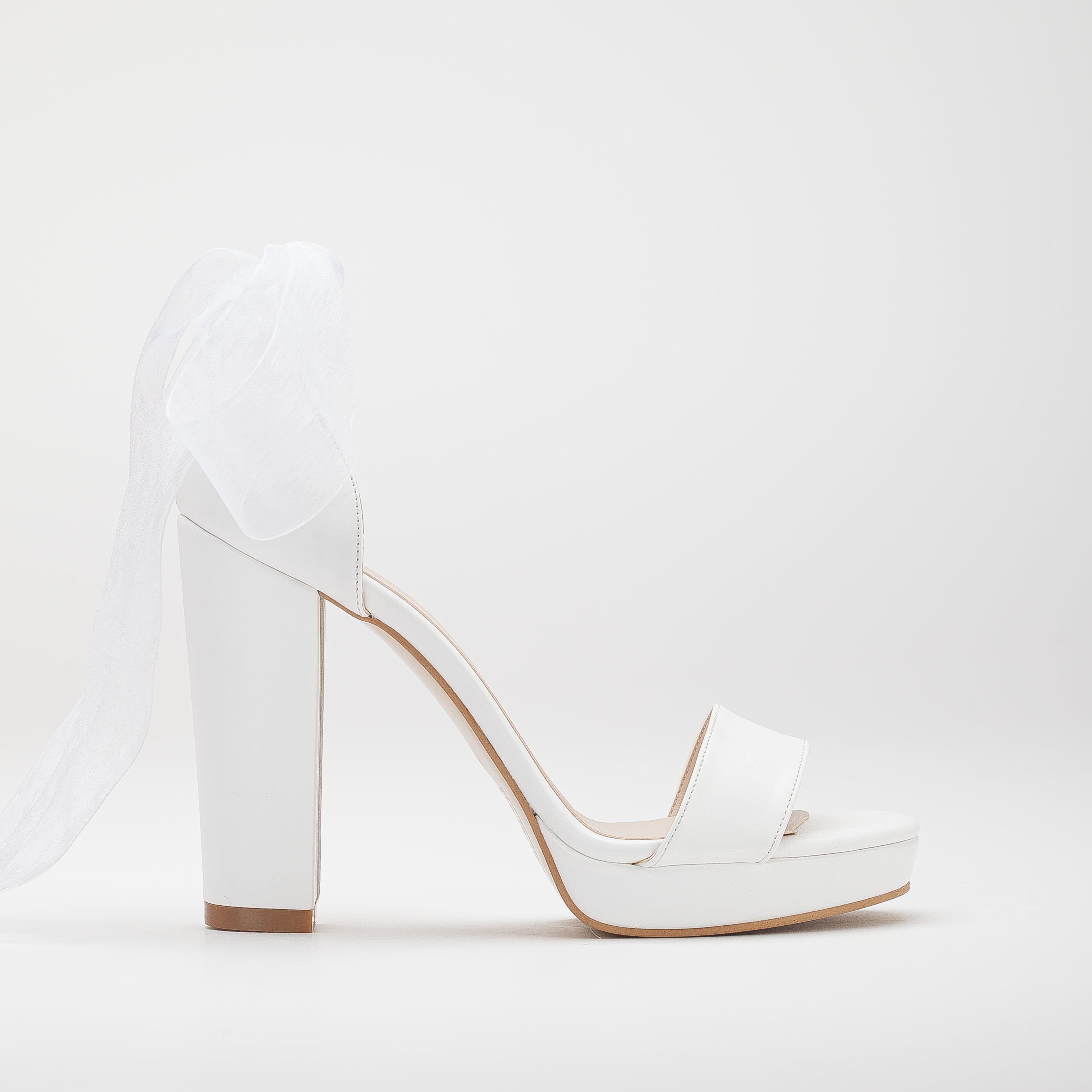 High platform white wedding shoes, Bridal platform heels, White wedding pumps, Elegant bridal footwear, Ivory platform wedding shoes, High heel wedding sandals, White bridal stilettos, Platform wedding shoes for brides, Tall heel wedding shoes, White platform bridal shoes