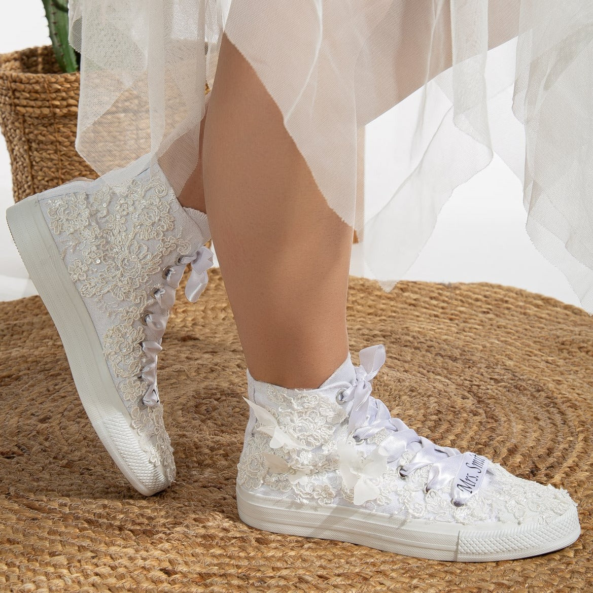 converse, white lace sneakers, lace-up white sneakers, white lace tennis shoes, lace detailed white sneakers, white lace casual shoes, white lace running shoes, women's white lace sneakers, white lace trainers, white lace slip-on sneakers, white lace fashion sneakers