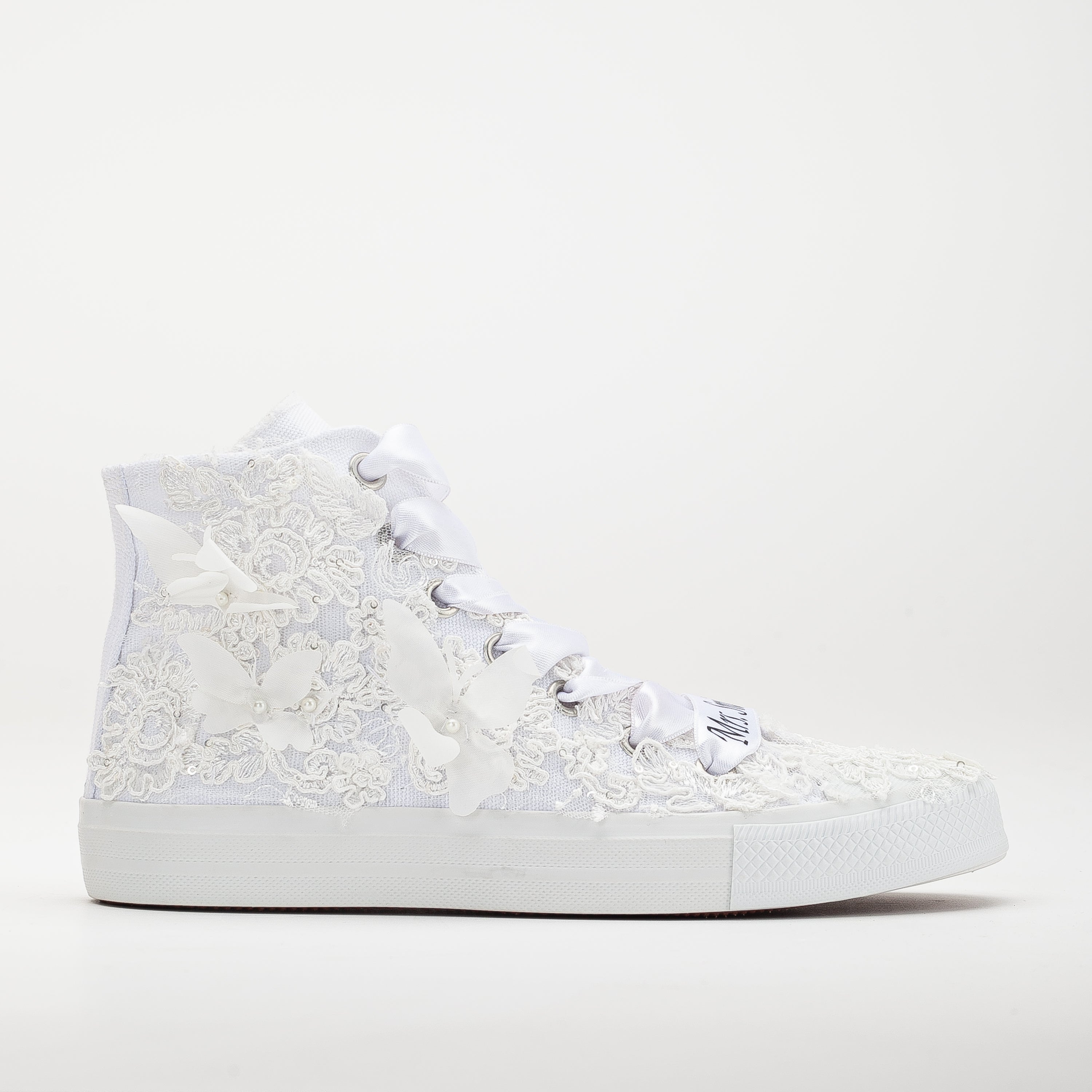 converse, white lace sneakers, lace-up white sneakers, white lace tennis shoes, lace detailed white sneakers, white lace casual shoes, white lace running shoes, women's white lace sneakers, white lace trainers, white lace slip-on sneakers, white lace fashion sneakers