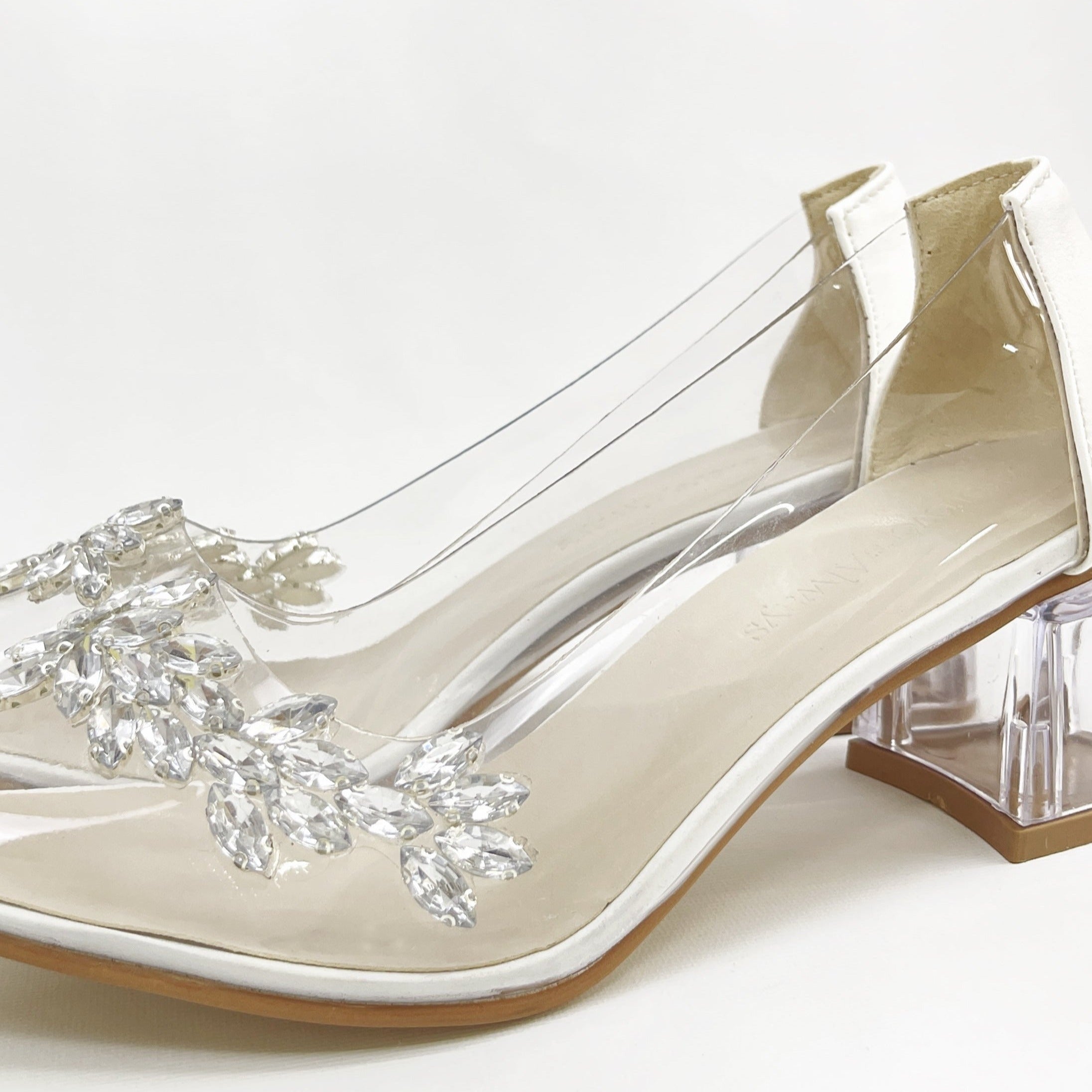 Cinderella transparent rhinestone white heels, Transparent rhinestone heels with white, Stylish Cinderella heels with rhinestones, Chic transparent heels with white accents, Trendy rhinestone embellished white heels, Fashionable Cinderella-inspired heels with rhinestones, Elegant transparent heels adorned with rhinestones and white.