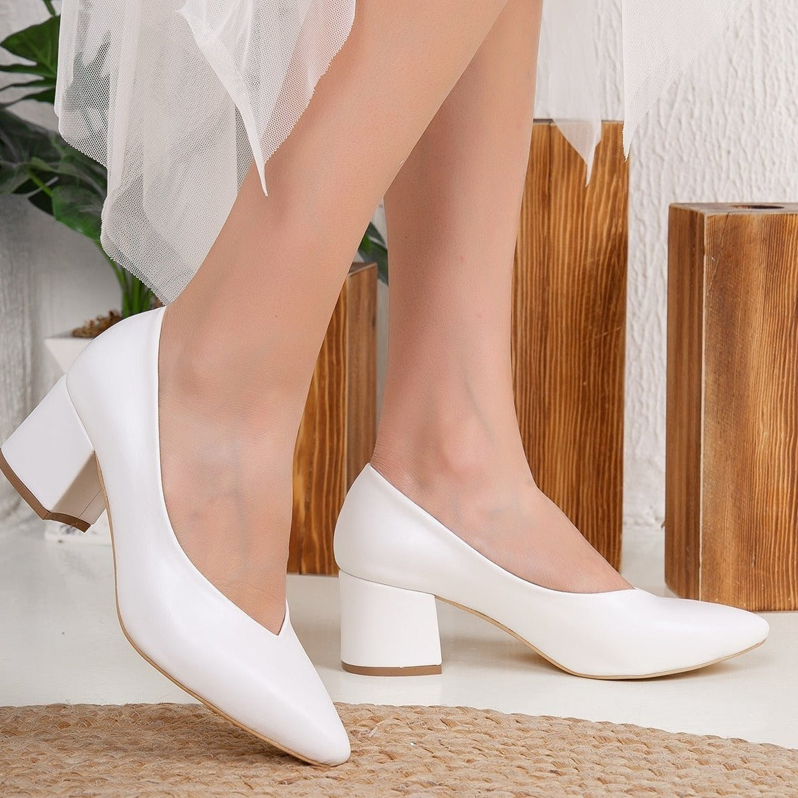 White low heel pumps, Low heel pumps in white, Stylish white pumps, Chic low heel white shoes, Trendy white low heel pumps, Fashionable white pumps, Elegant low heel white pumps, Classic white low heel shoes, Comfortable white low heel pumps, White low heel pumps for women.