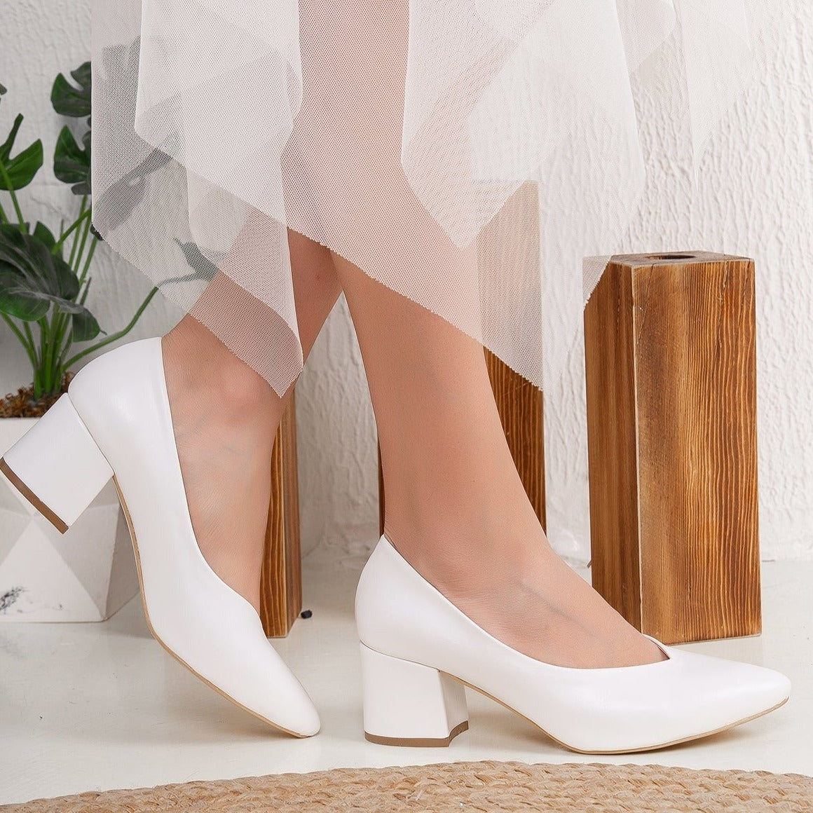 White low heel pumps, Low heel pumps in white, Stylish white pumps, Chic low heel white shoes, Trendy white low heel pumps, Fashionable white pumps, Elegant low heel white pumps, Classic white low heel shoes, Comfortable white low heel pumps, White low heel pumps for women.